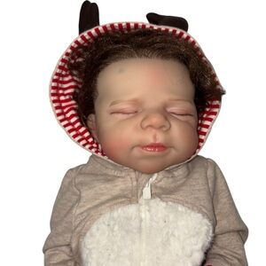 Adorable Baby doll. Looks real. Super cute!